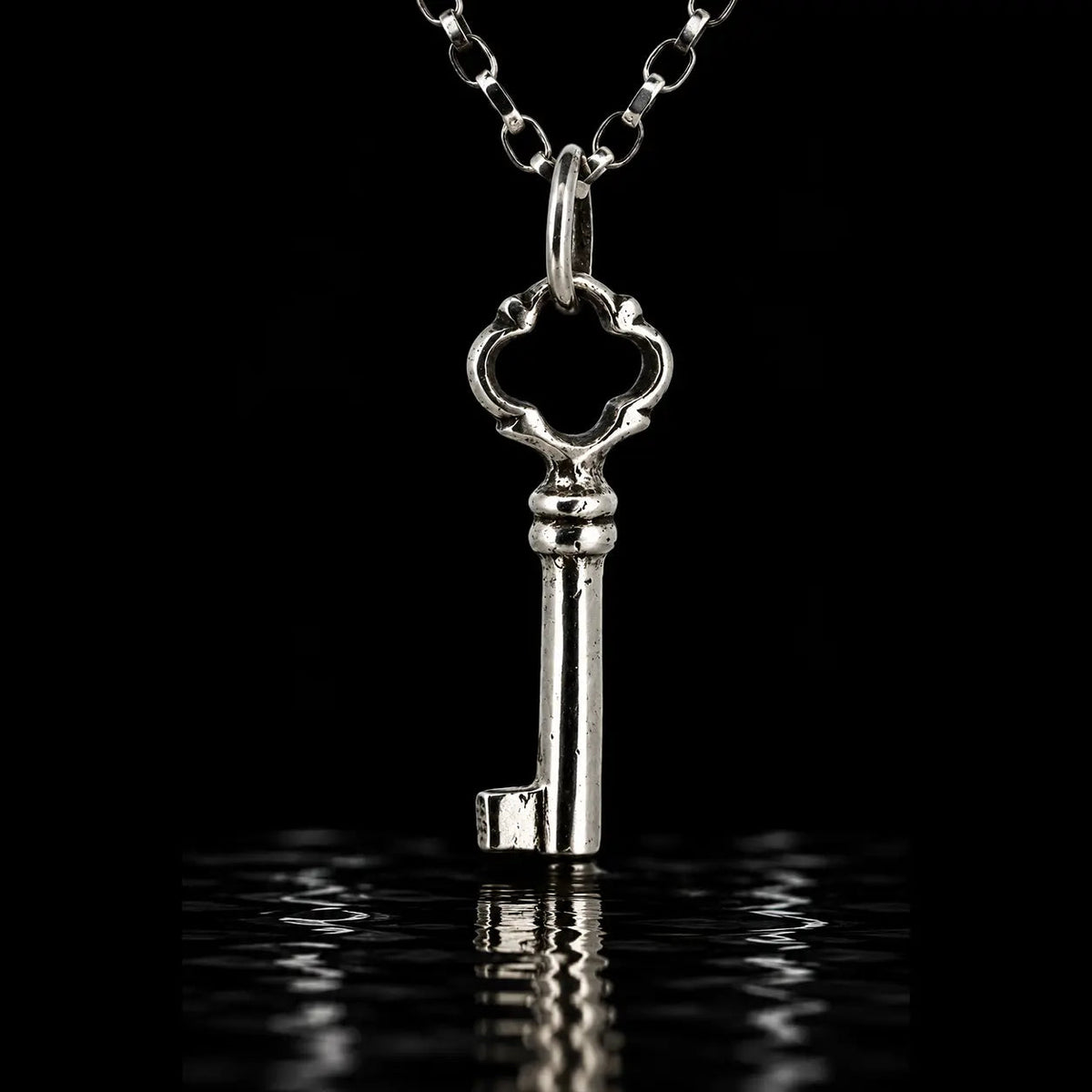 Tiny silver Key Pendant - Curiouser Collective