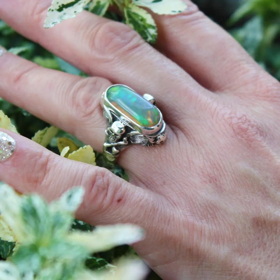 Winged Skull & Crossed Bone Opal Ring Curiouser Collective